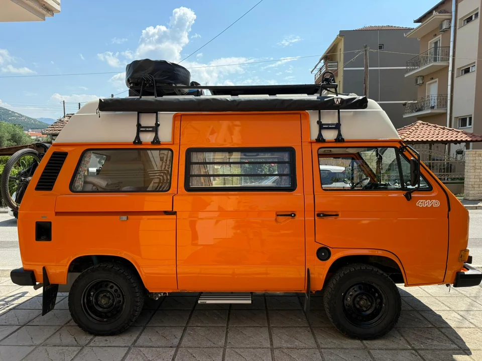 Orangefarbener VW T3 mit Hochdach aus einer ProCheck-Fahrzeugwertermittlung